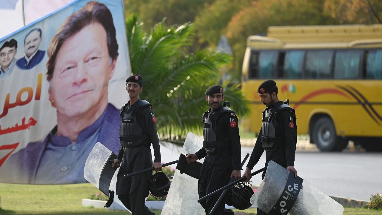 Security personnel are geared up to tackle any violence that may erupt. Credit: AFP Photo