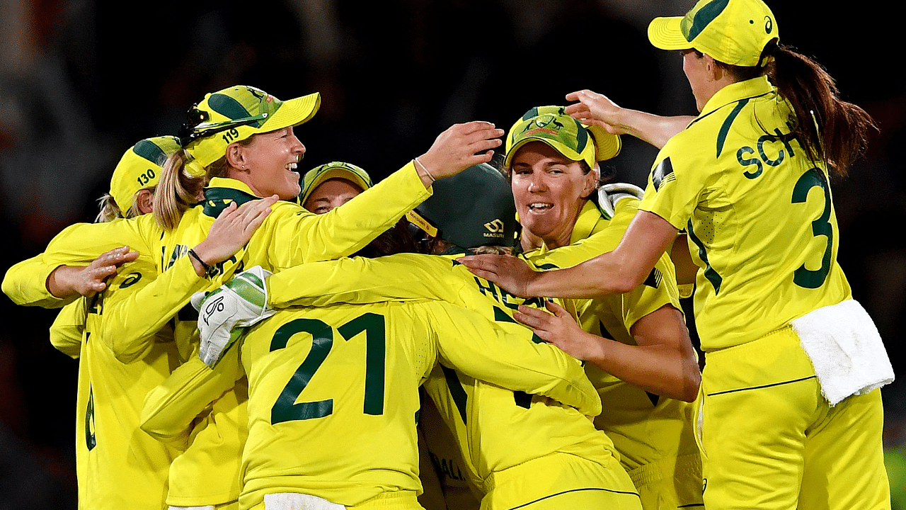 Australia celebrate their win in the 2022 Women's Cricket World Cup final match between England and Australia. Credit: AFP Photo