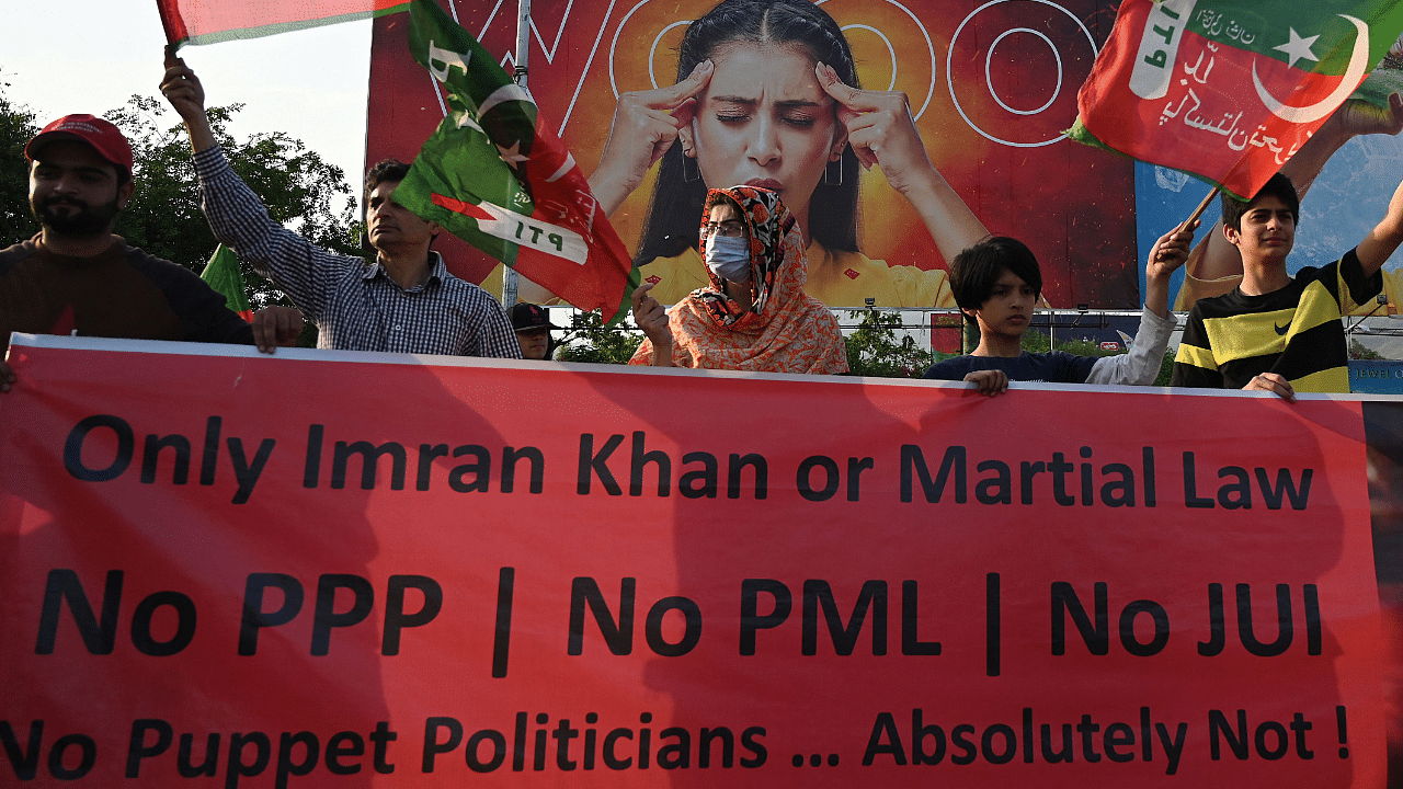 Supporters of ruling Pakistan Tehreek-e-Insaf (PTI) party take part in a rally in Islamabad. Credit: AFP Photo