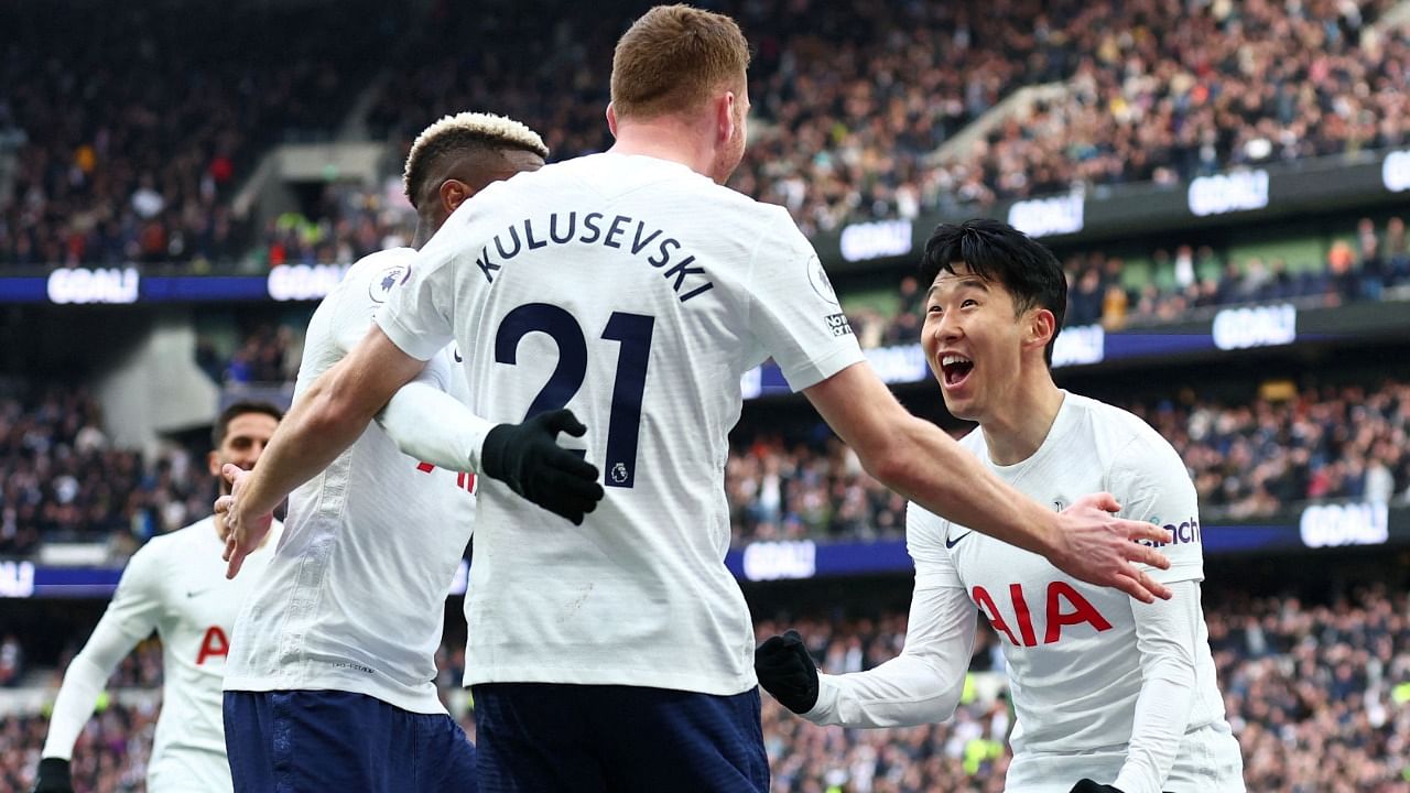 Tottenham Hotspur's Son Heung-min celebrates scoring their third goal with teammates. Credit: Reuters Photo