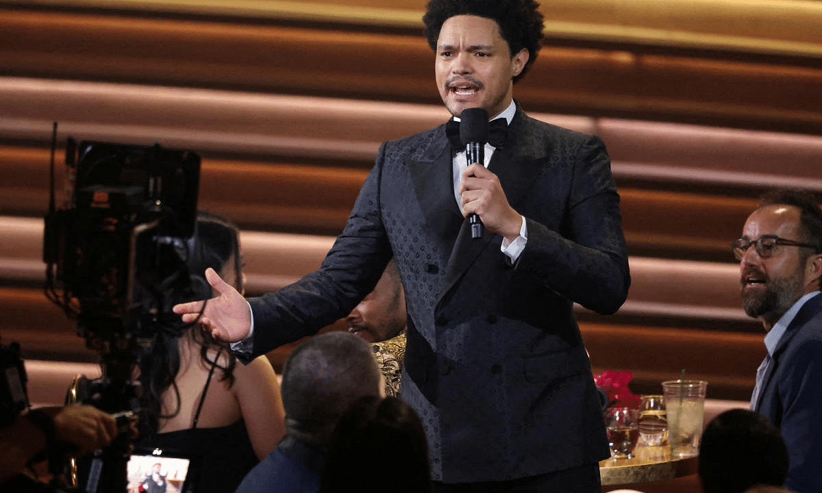 Trevor Noah served as the host for Grammys 2022. Credit: Reuters Photo/Mario Anzuoni