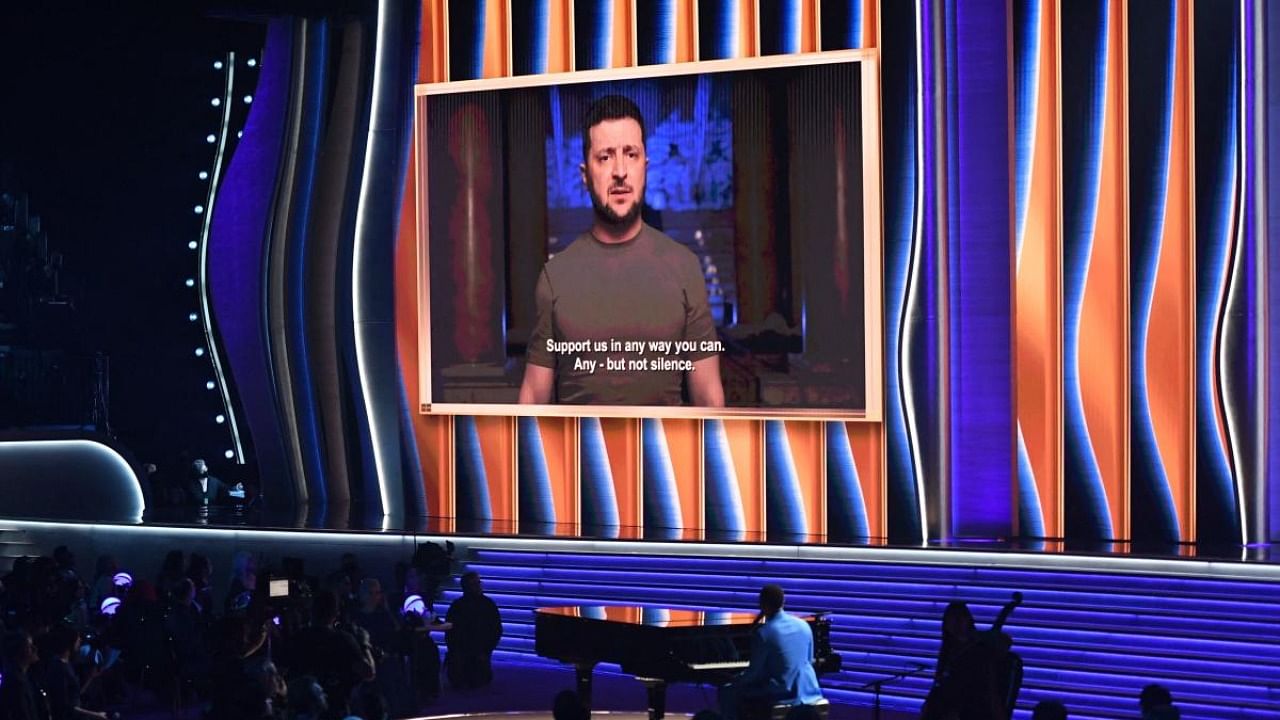 Ukraine's President Volodymyr Zelenskyy appears on screen during the 64th Annual Grammy Awards at the MGM Grand Garden Arena in Las Vegas on April 3, 2022. Credit: AFP Photo