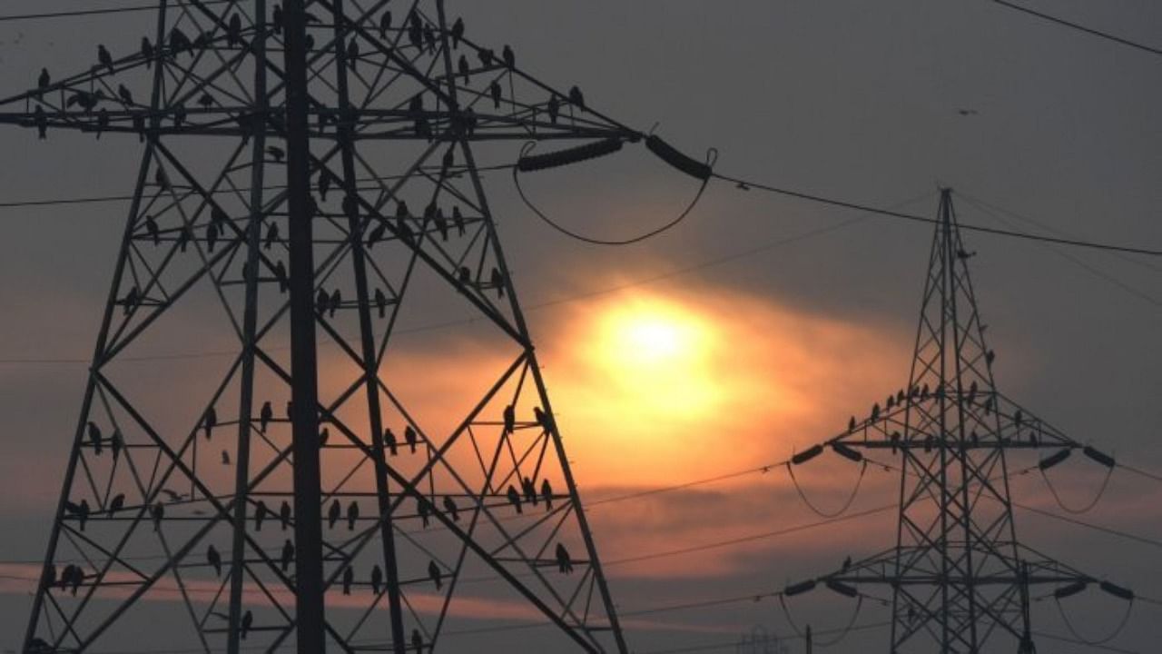 The electricity supplying companies (escoms) have a total revenue deficit of Rs 3,143.16 crore. Credit: AFP Photo