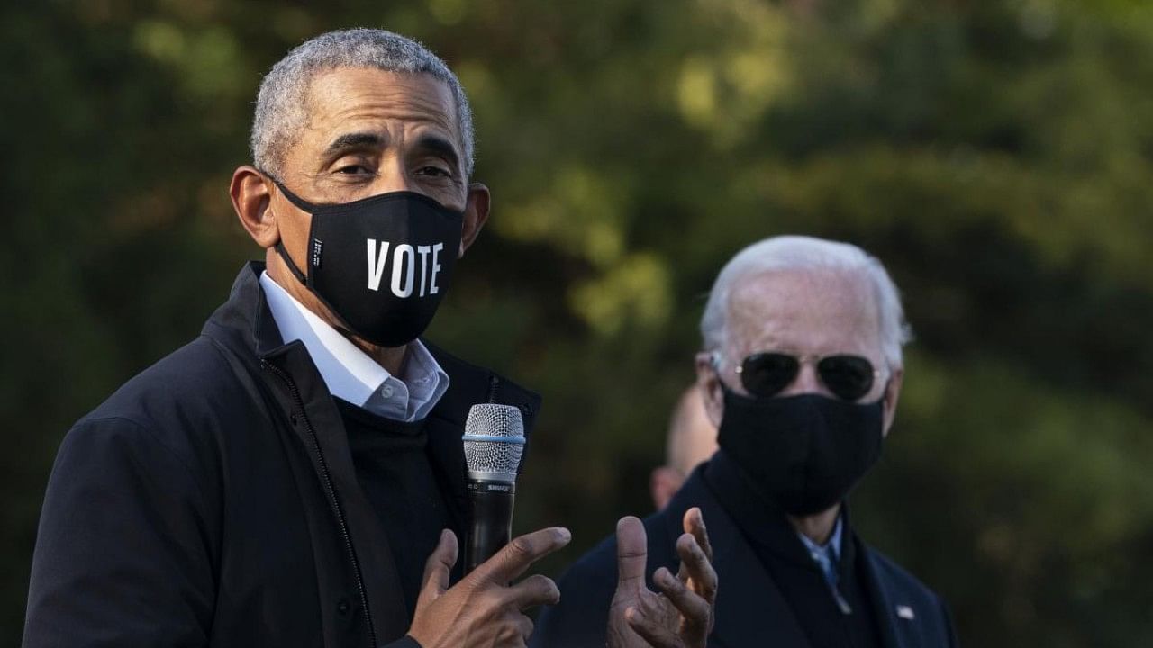 Barack Obama and US President Joe Biden (R). Credit: AFP File Photo