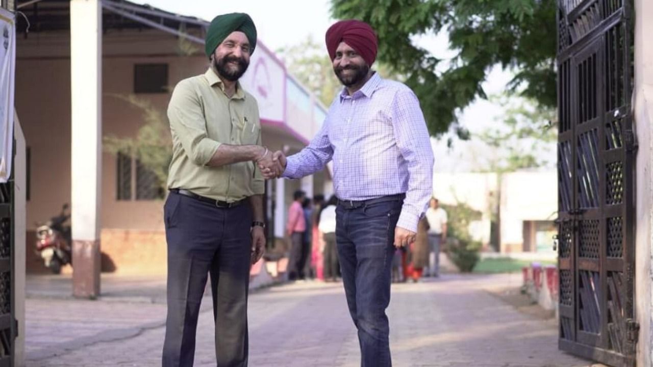 GCMMF MD RS Sodhi (L) and Kulmeet Bawa, president and MD of SAP India. Credit: DH Photo