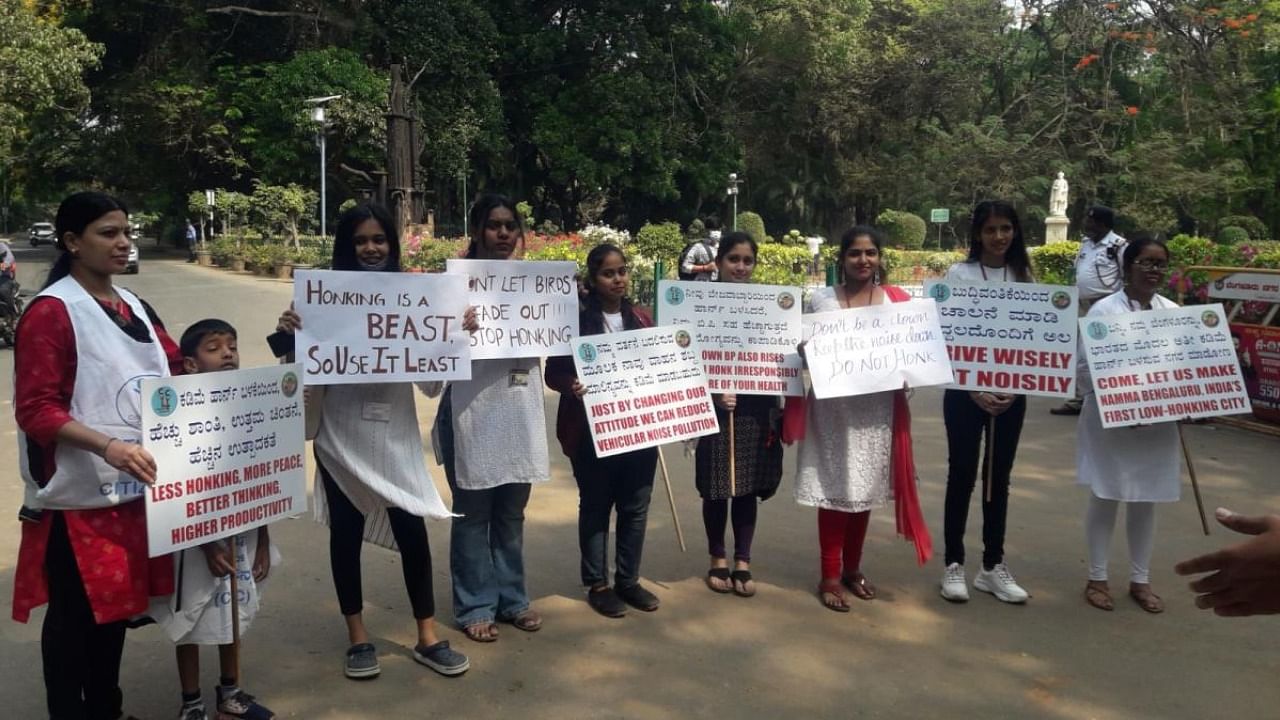 Activists along with students from Mount Carmel College organised an awareness campaign at Cubbon Park on Tuesday morning. Credit: DH Photo