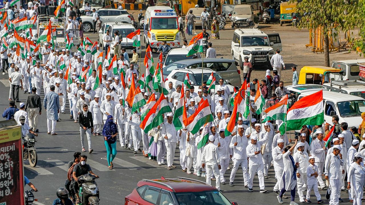 Supporters of Congress party during the 'Azadi Gaurav Yatra' in Ahmedabad, Wednesday, April 6, 2022. The Yatra will culminate at Rajghat in Delhi. Credit: PTI Photo