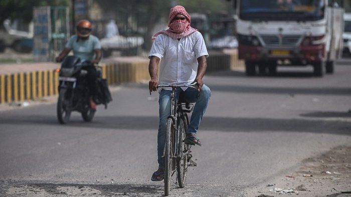 Parts of the national capital have been reeling under a heatwave since March last week with their maximum temperature hovering above 40 degrees Celsius. Credit: AFP File Photo