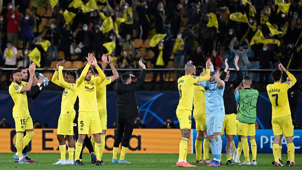 Villareal's players celebrate at the end of during the UEFA Champions League quarter final first leg football match between Villarreal CF and Bayern Munich. Credit: AFP Photo