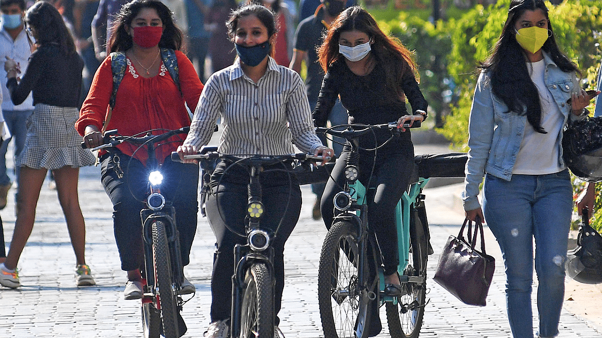 Women are seen riding e-cycle. Credit: DH Photo