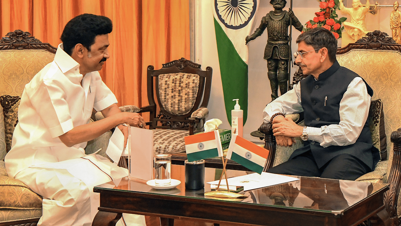 Tamil Nadu Chief Minister MK Stalin interacts with Governor R.N. Ravi. Credit: PTI Photo