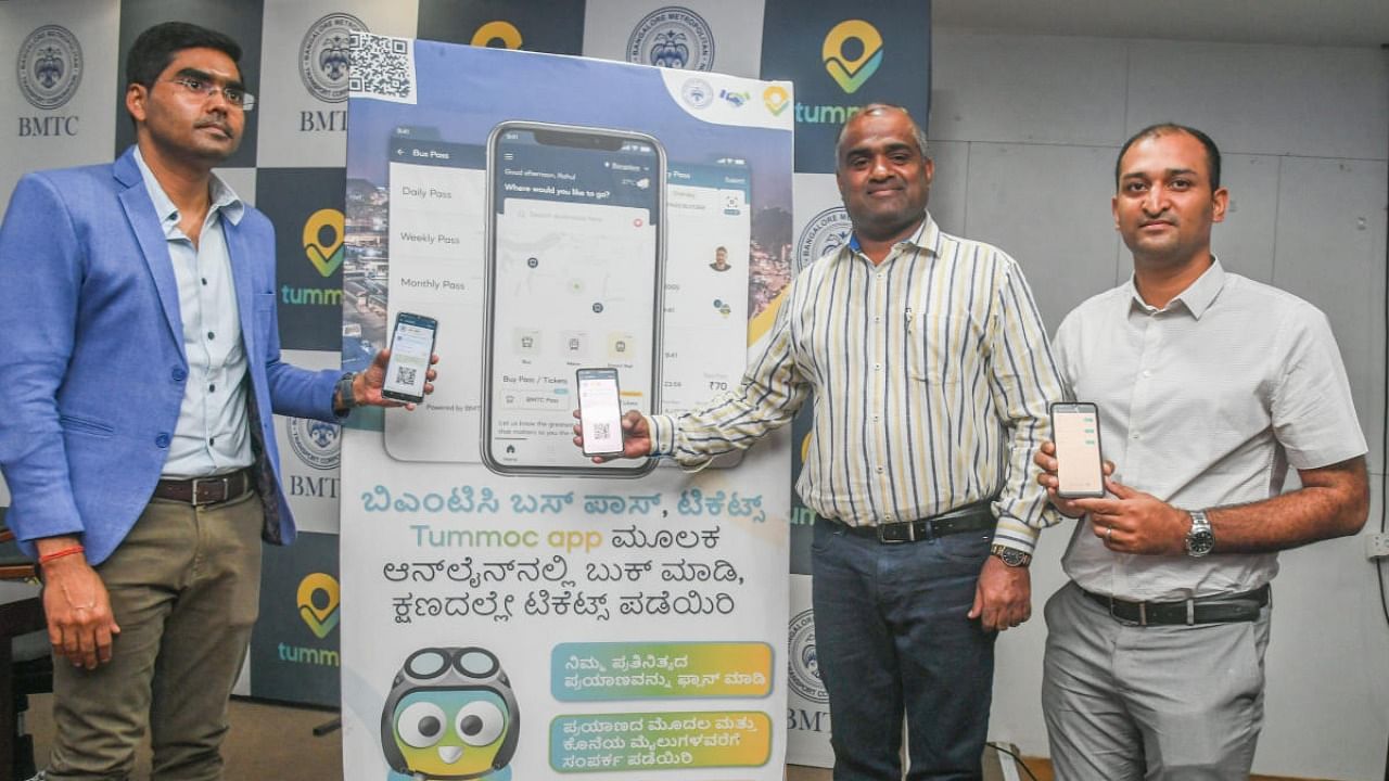 (Left to right) Hiranmay Mallick, co-founder and CEO Tummoc; V Anbukkumar, BMTC Managing Director; and A V Surya Sen, BMTC Director (IT); launch the app for bus passes at the BMTC office in Shanthinagar on Wednesday. Credit: DH Photo
