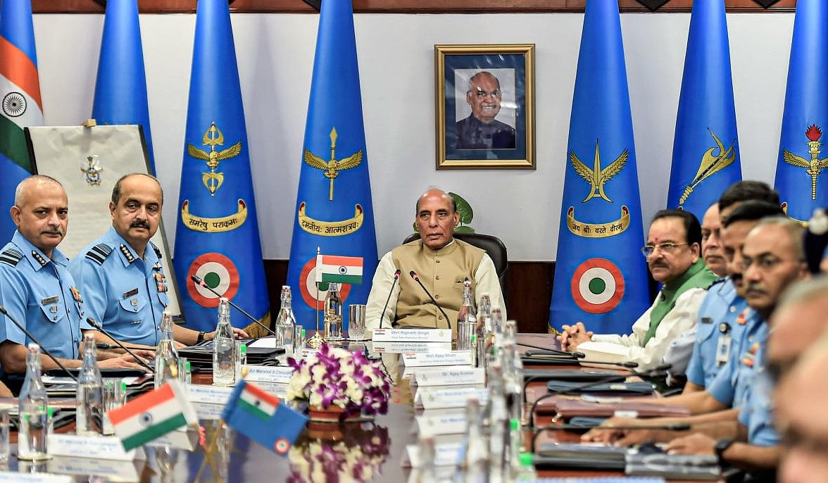 Union Defence Minister Rajnath Singh with IAF chief Air Chief Marshal V R Chaudhari during the Air Force Commanders' conference at Vayu Bhawan in New Delhi. Credit: PTI