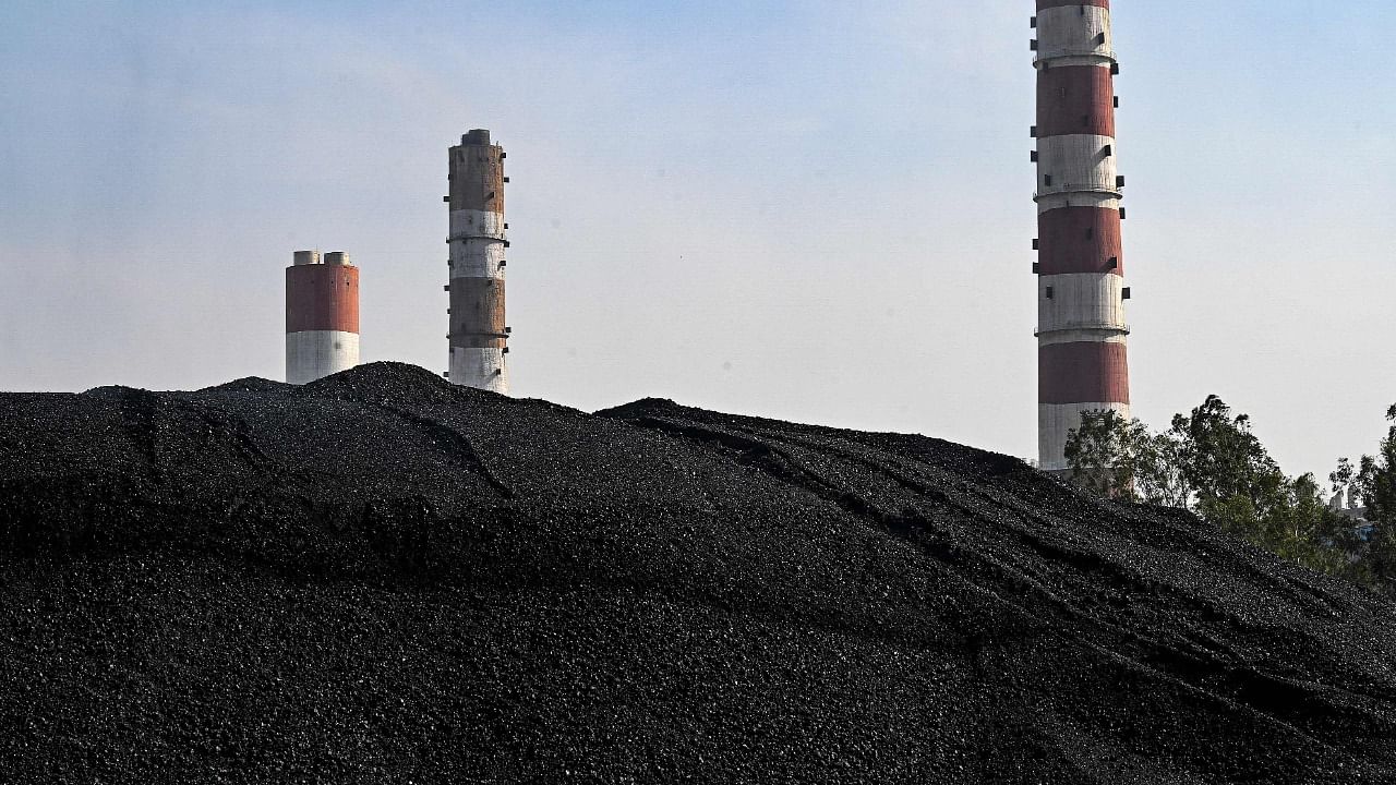This photograph shows coal stored outdoors at the NTPC plant in Dadri, Uttar Pradesh. Credit: AFP Photo