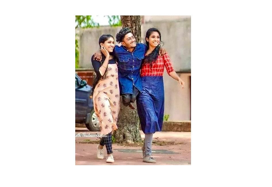 Alif Mohammed carried by friends Arya and Archana, students of  DB College at Sasthamcotta in the Kollam district of Kerala. Picture shared by Jagath Thulaseedharan on social media