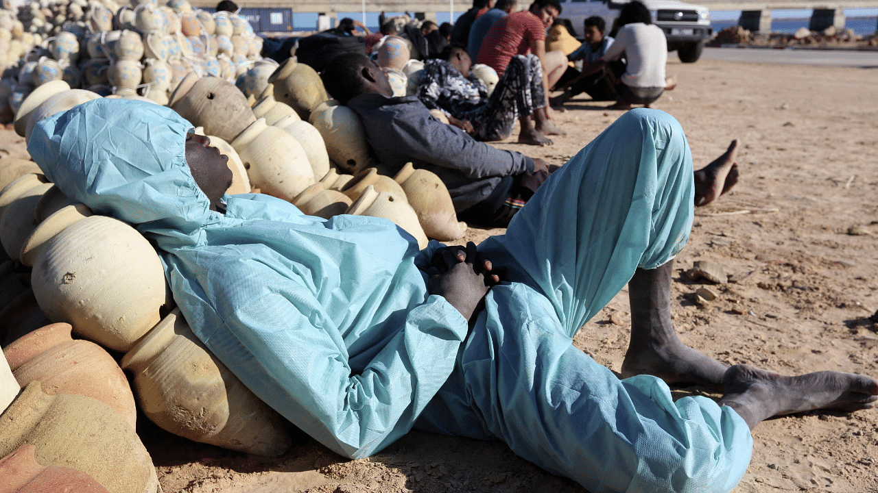 Migrants rescued by Tunisia's national guard during an attempted crossing of the Mediterranean by boat. Credit: AFP Photo