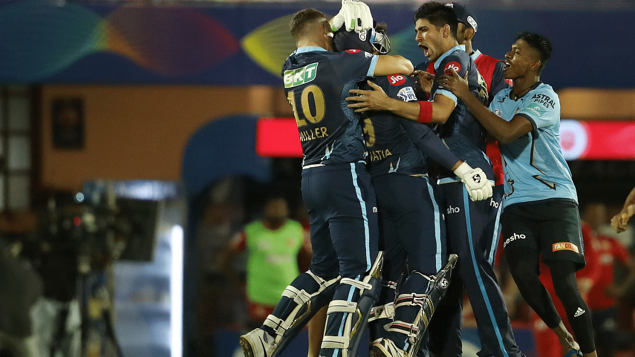 Gujarat Titans celebrate the win during T20 cricket match 16 of the Indian Premier League 2022. Credit: PTI Photo