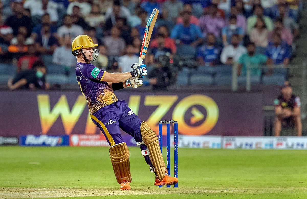 vPat Cummins of Kolkata Knight Riders plays a shot during match 14 of the Indian Premier League 2022 cricket tournament between the Kolkata Knight Riders and the Mumbai Indians, at the MCA International Stadium in Pune. CRedit: PTI PHoto