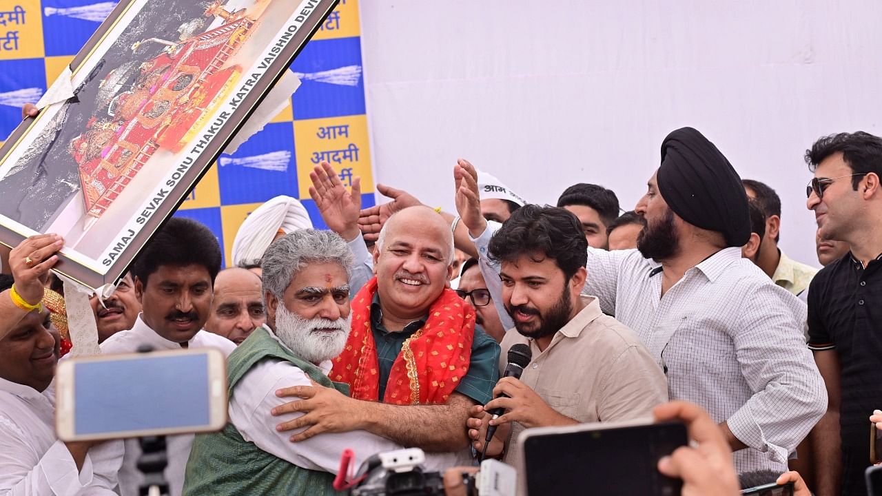 Leaders and sarpanch of Jammu and Kashmir region join Aam Aadmi Party (AAP), in the presence of Delhi Deputy CM Manish Sisodia, at AAP office in New Delhi. Credit: PTI photo