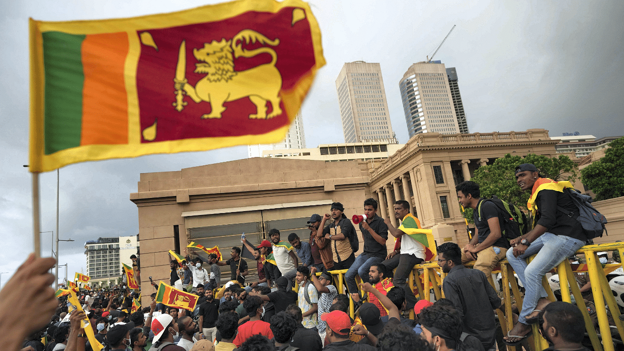 Sri Lankans protest outside the president's office in Colombo, Sri Lanka. Credit: Reuters Photo