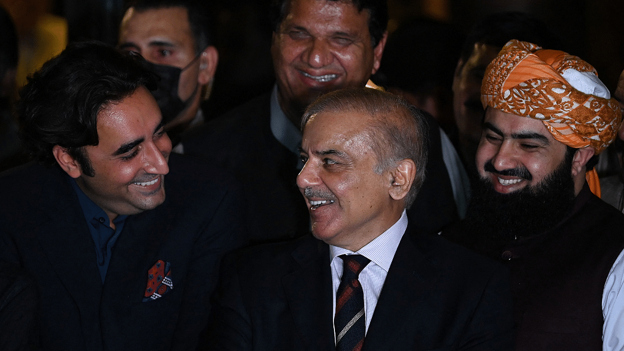 Pakistan's opposition leader Shahbaz Sharif (C) and Bilawal Bhutto Zardari (R). Credit: AFP Photo