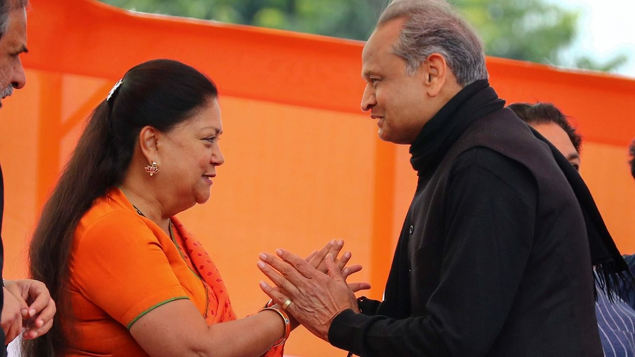 Vasundhara Raje (L) and Ashok Gehlot. Credit: PTI File Photo