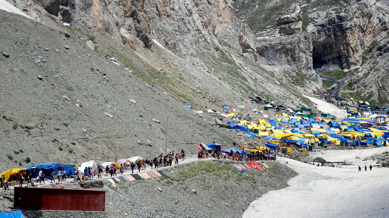  Hindu devotees on their way to the holy cave shrine of Amarnath. Credit: PTI Photo