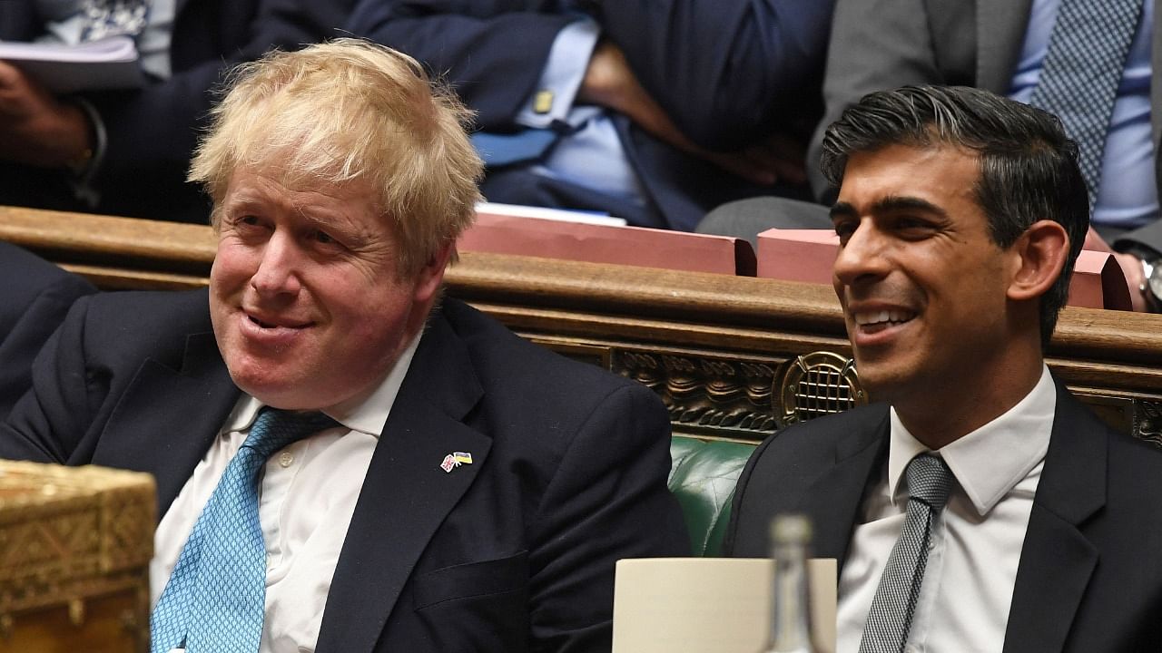 UK Prime Minister Boris Johnson (L) and Finance Secretary Rishi Sunak. Credit: AFP File Photo