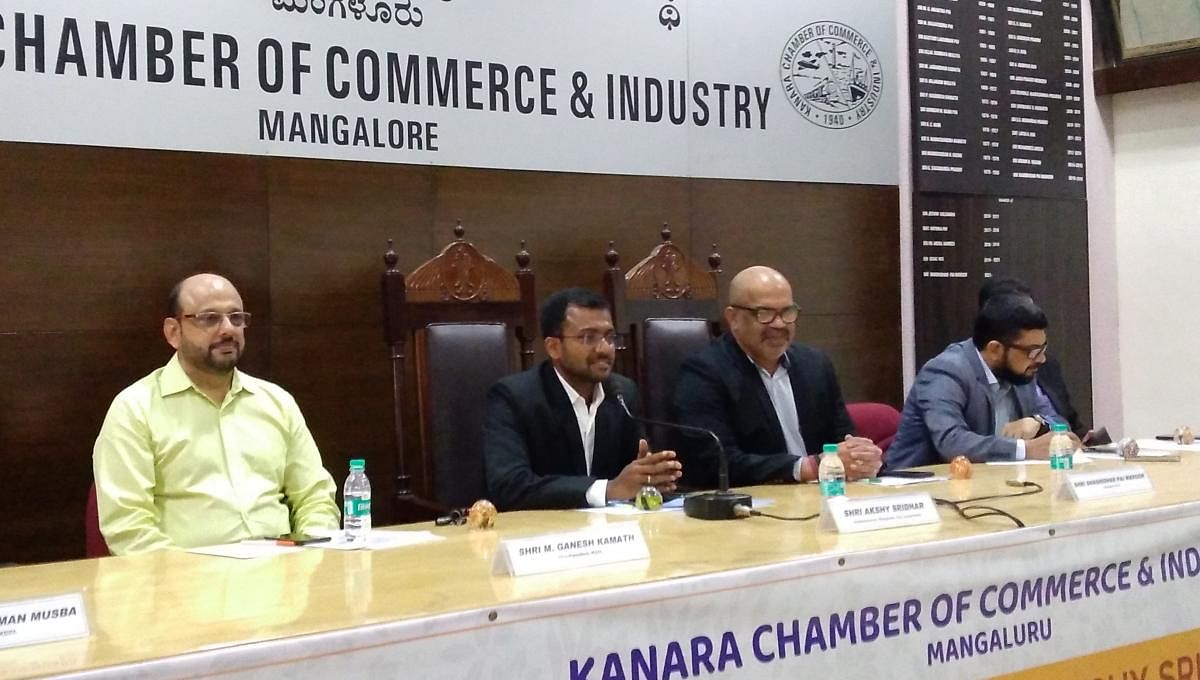 Mangaluru City Corporation Commissioner Akshy Shridhar (second from left) during an interaction with entrepreneurs at KCCI hall in Mangaluru on Monday. DH Photo