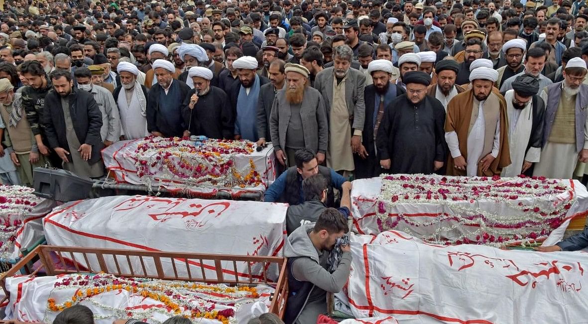 FILE PHOTO: Mourners offer funeral prayers for bomb blast victims a day after a suicide attack at a Shiite mosque in Pakistan. Credit: AFP