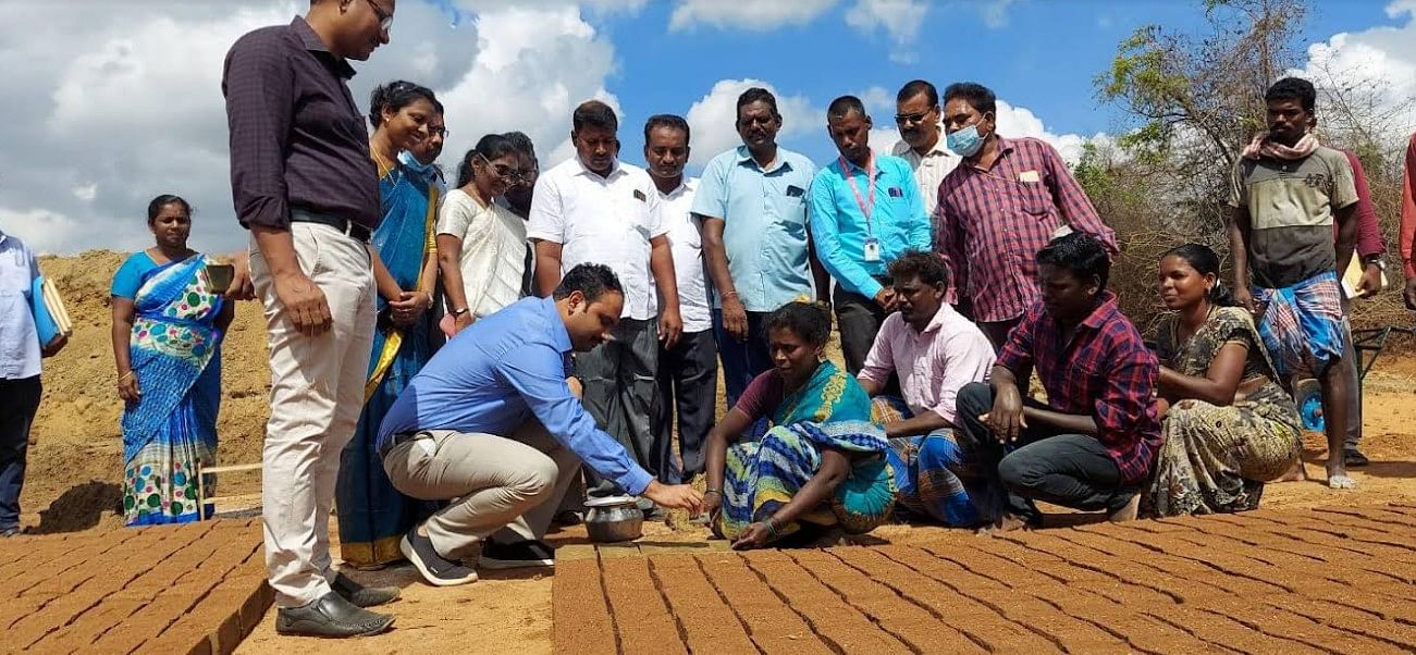 Tiruvallur District Collector Alby John with bonded labourers-turned owners of brick kiln. Credit: Special Arrangement