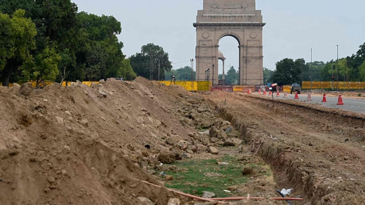  site of a redevelopment work of the Central Vista Avenue by Central Public Works Department (CPWD) along the Rajpath road is pictured in front of the India Gate. Credit: AFP Photo