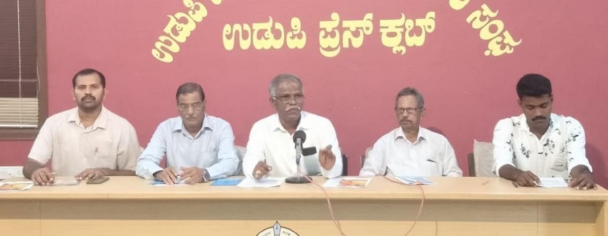 Rajya Sauharda Samyukta Sahakari Director S K Manjunath speaks to reporters in Udupi.