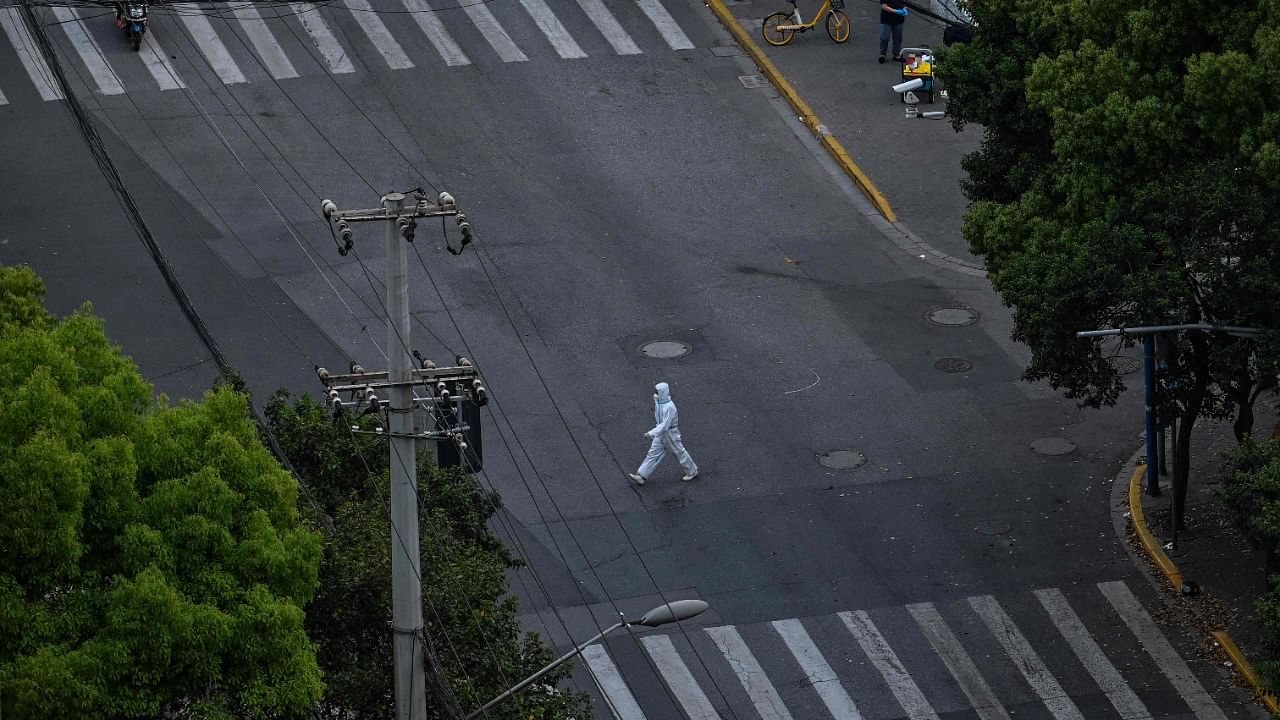 Wider curbs to stop the spread of the highly infectious Omicron variant have led to logistical and supply chain disruptions that are taking a growing economic toll, adding to expectations that China's central bank will soon announce more stimulus measures. Credit: AFP Photo