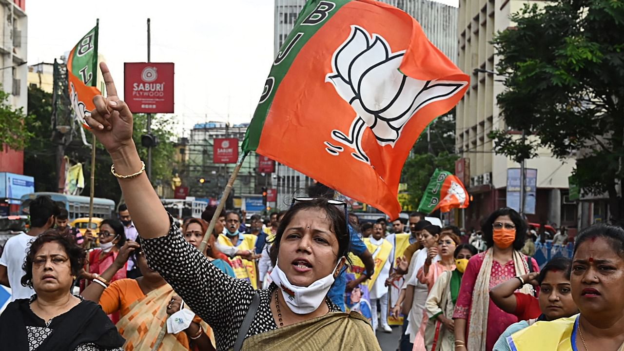 Activists of the Bhartiya Janata Party (BJP) shout slogans against the state government for the recent alleged rapes and murders around the state in Kolkata. Credit: AFP Photo