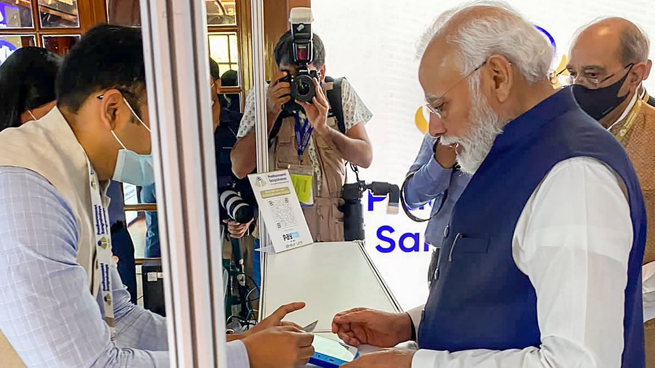 PM Modi buys the first ticket at the museum. Credit: PTI Photo
