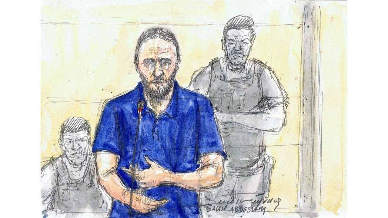 This court-sketch made on April 14, 2022, shows co-defendant Salah Abdeslam during the trial of November 13, 2015 Paris and Saint-Denis attacks. Credit: AFP Photo