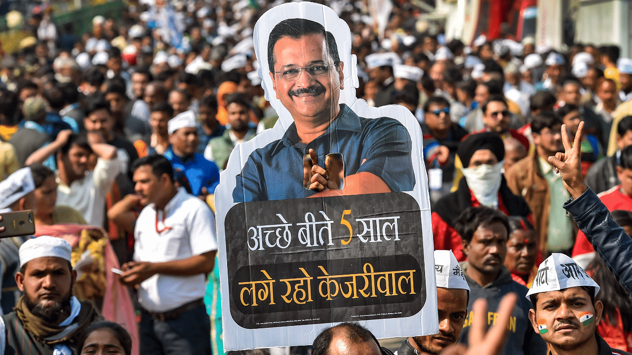 AAP volunteers at Ramlila Maidan cheer for Delhi Chief Minister Arvind Kejriwal. Credit: PTI Photo