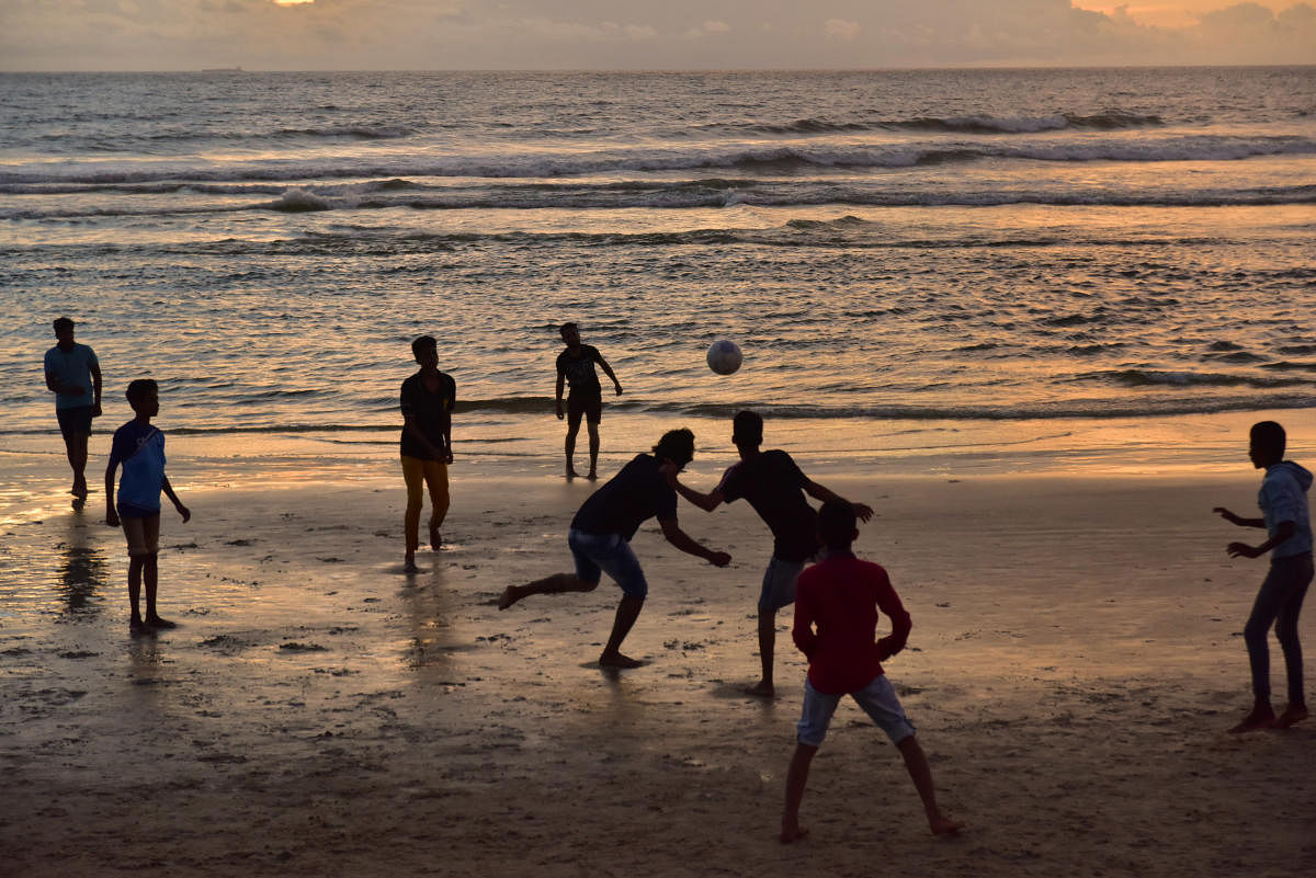 A file photo of youth playing along the shores of Idya Beach in Surathkal.
