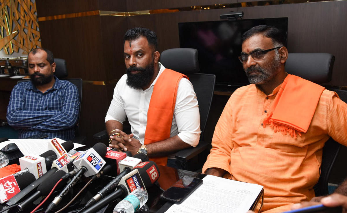 Akhila Bharat Hindu Mahasabha state president Rajesh Pavithran speaks to reporters in Mangaluru.