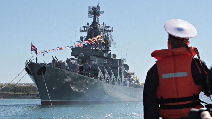 A sailor looks at the Russian missile cruiser Moskva moored in the Ukrainian Black Sea port of Sevastopol. Credit: Reuters file photo