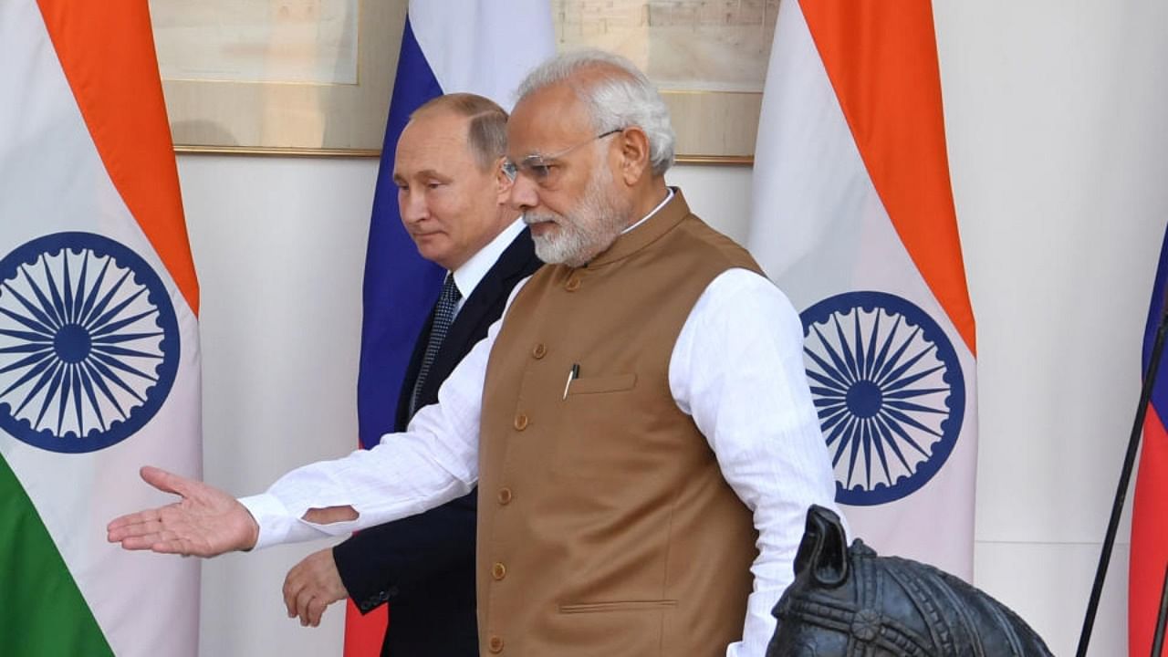 PM Modi with Vladimir Putin. Credit: Reuters Photo