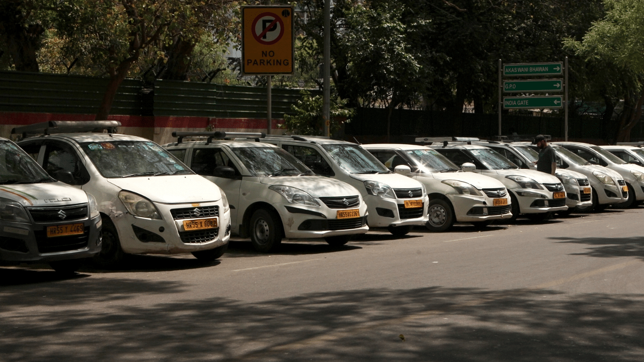  Delhi NCR Taxi Driver Union parked their taxis on a roadside to protest against Centre and State government over hike in the CNG and fuel prices. Credit: IANS Photo
