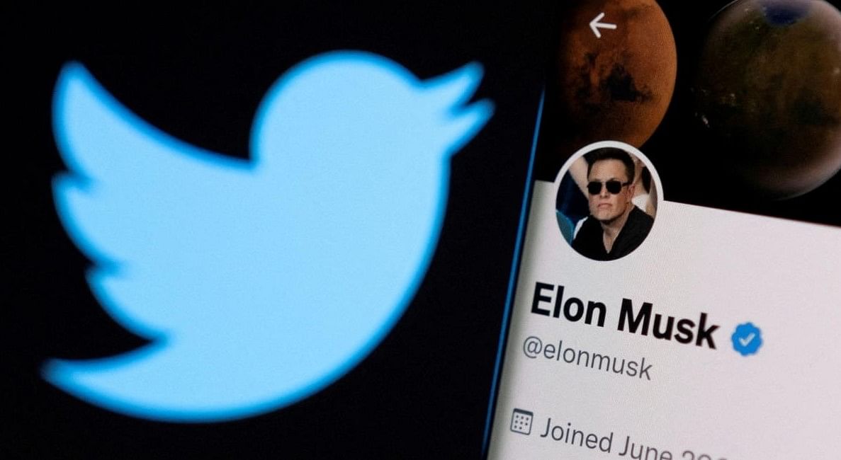 FILE PHOTO: A photo illustration shows Elon Musk's twitter account and the Twitter logo. Credit: Reuters