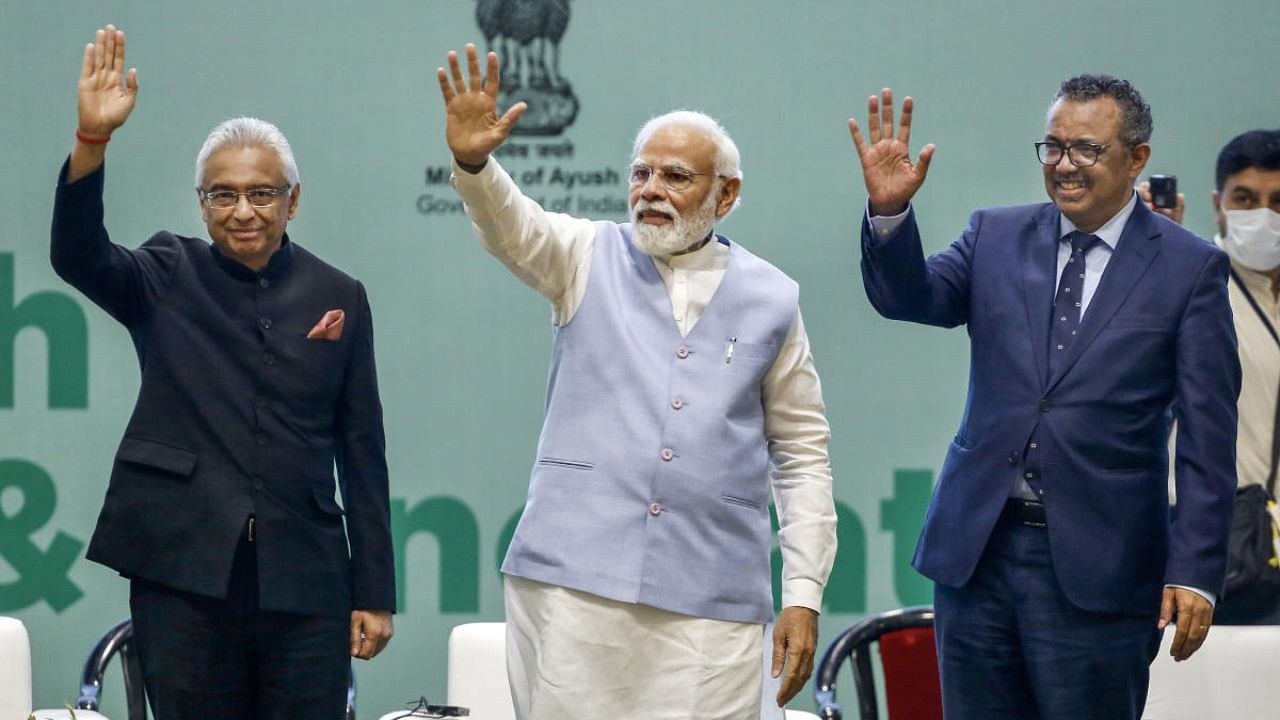  Prime Minister Narendra Modi, Director General of World health organization (WHO) Tedros Adhanom Ghebreyesus and Mauritius Prime Minister Pravind Jugnauth during the 'Global Ayush Investment and Innovation Summit'. Credit: PTI Photo