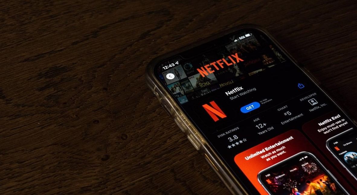 In this photo illustration, the Netflix app is shown on a mobile phone. Credit: 