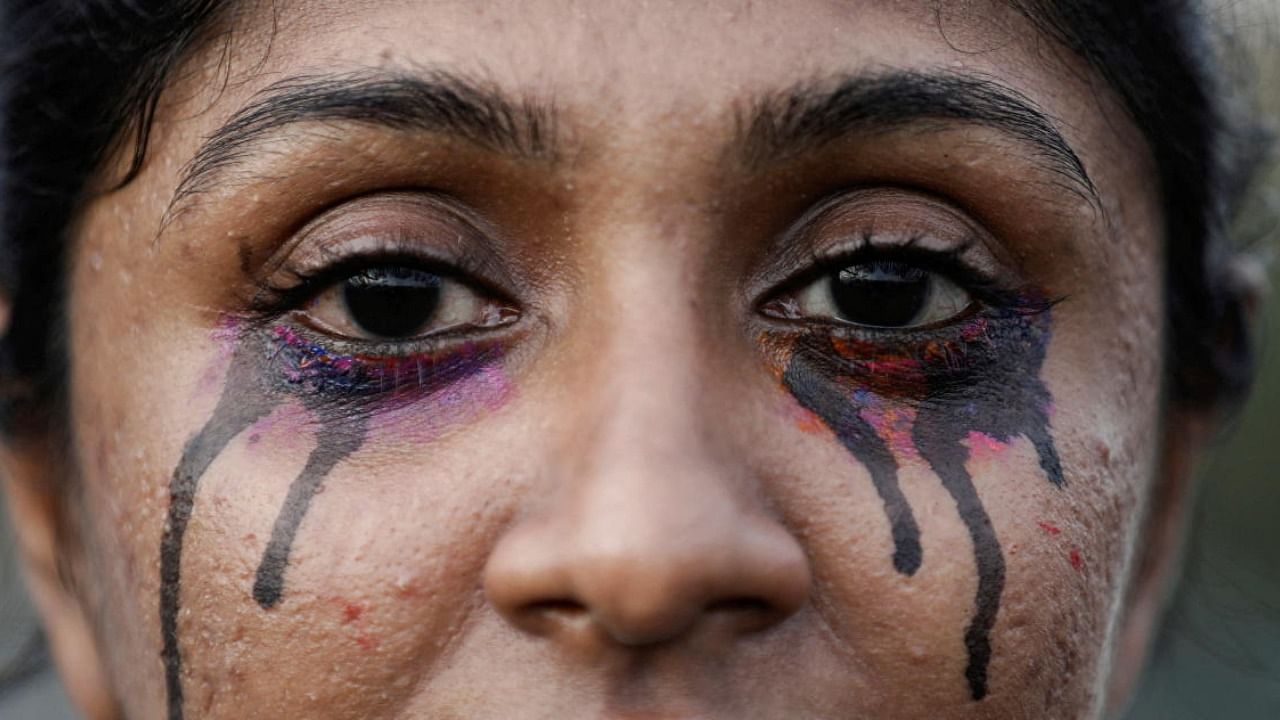 A demonstrator is seen during a protest against Sri Lanka PresidenA demonstrator is seen during a protest against Sri Lanka President Gotabaya Rajapaksa in front of the Presidential Secretariat, amid the country's economic crisis in Colombo, Sri Lanka, April 19, 2022. Credit: Reuters Photo