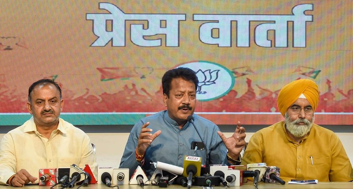 [FILE Photo] Mayors Shyam Sundar Aggarwal (East Delhi), Raja Iqbal Singh (North Delhi) and Leader of House in SDMC Inderjeet Sehrawat (L) address a joint press conference, in New Delhi, Friday, April 15, 2022. (PTI Photo/Manvender Vashist)