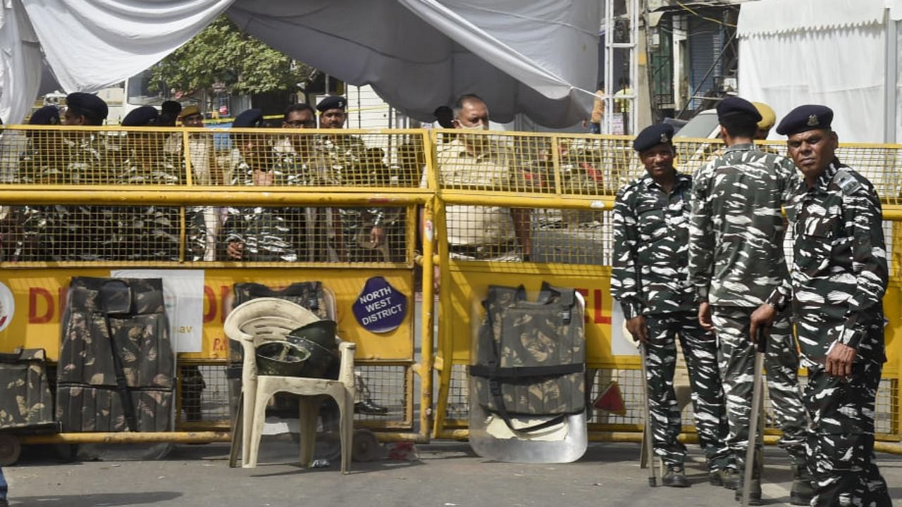 Security personnel patrol in the violence-hit Jahangirpuri area, in New Delhi. Credit: PTI Photo