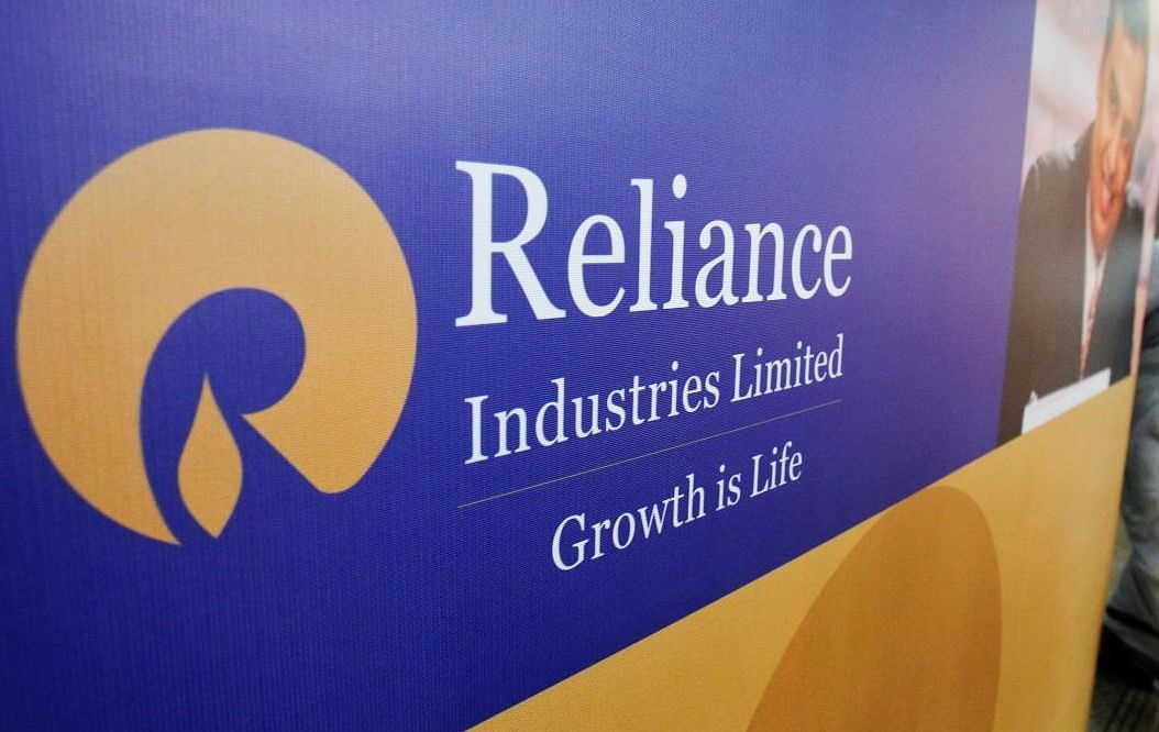 FILE PHOTO: A poster of Reliance Industries installed outside the venue of the company's annual general meeting in Mumbai. Credit: Reuters